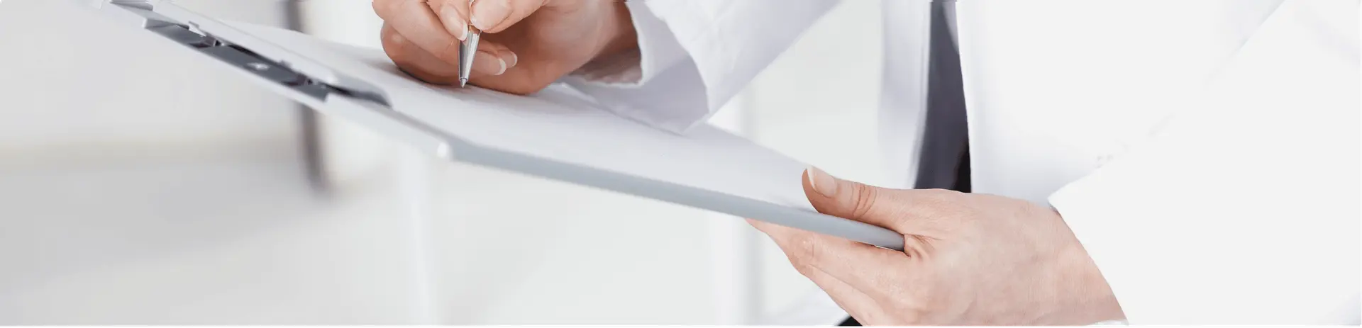 Clinician reviewing health documentation