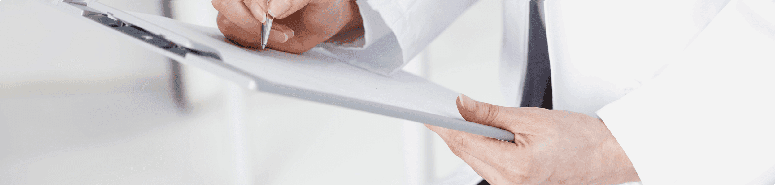 Clinician reviewing health documentation